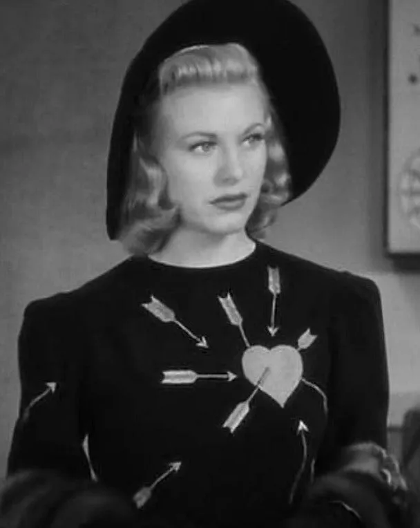 "Carefree" Pierced Heart Sweater by Astro Bettie